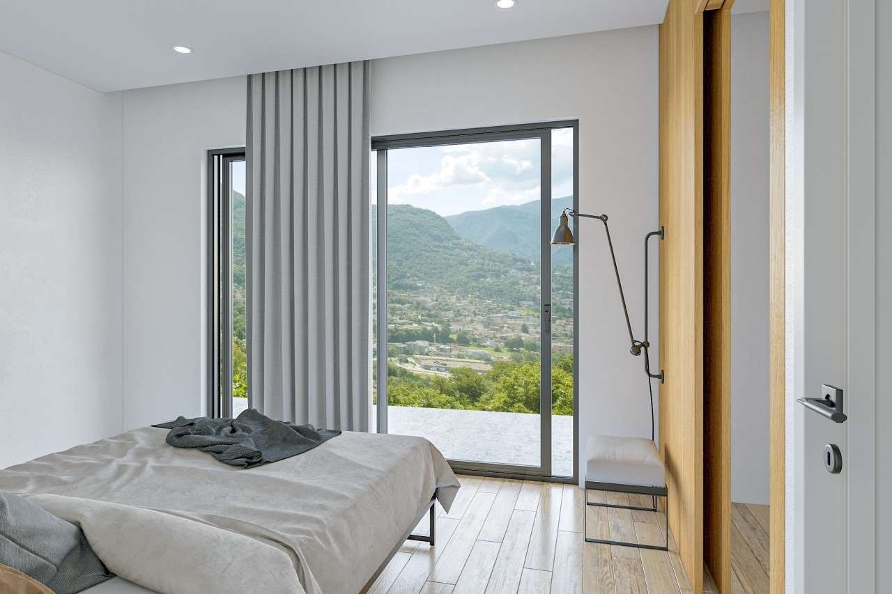 Luminoso Attico Vista Lago In Nuova Residenza Apartment in Comano, Ticino, Switzerland